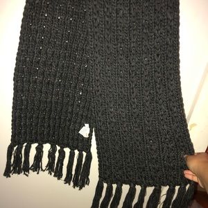 Long knitted gray scarf